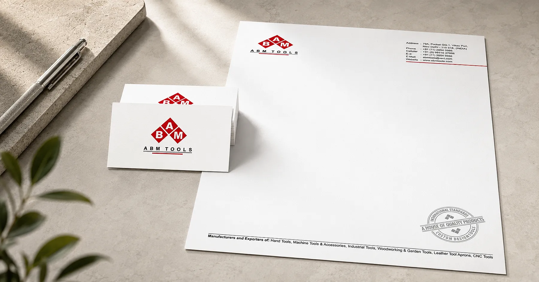 ABM Tools identity and stationery design — industrial equipment, India