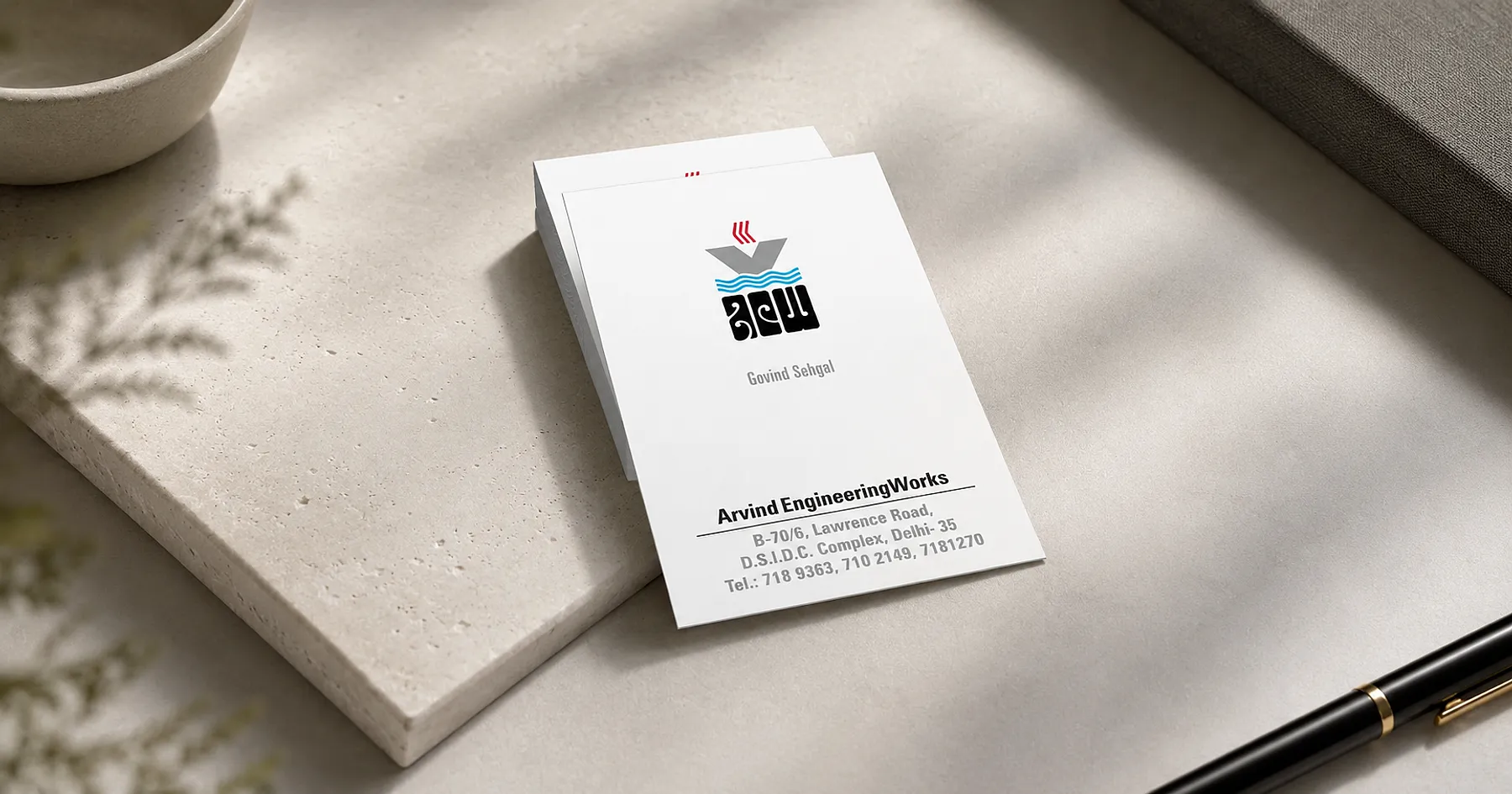 Arvind Engineering Works identity and business card design — industrial equipment, India